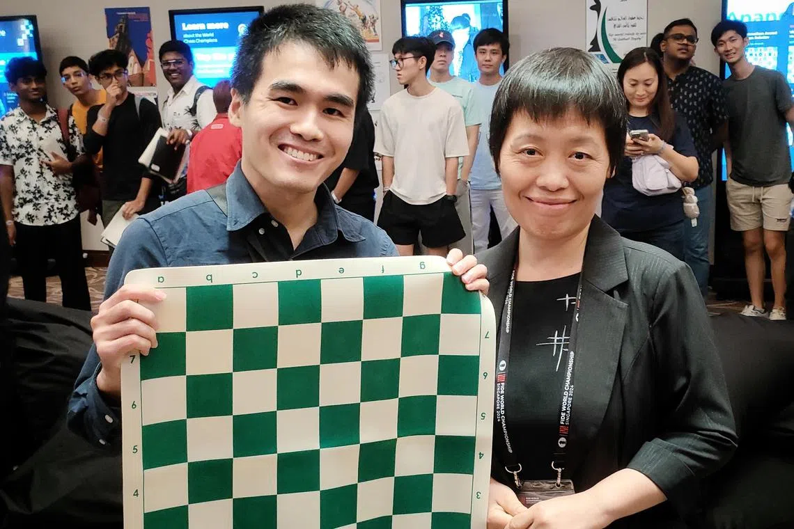 A delighted John Chan, a research fellow in Singapore, after his game with Xie Jun, the first Asian woman to become a Grandmaster.


CREDIT: COURTESY OF JOHN CHAN