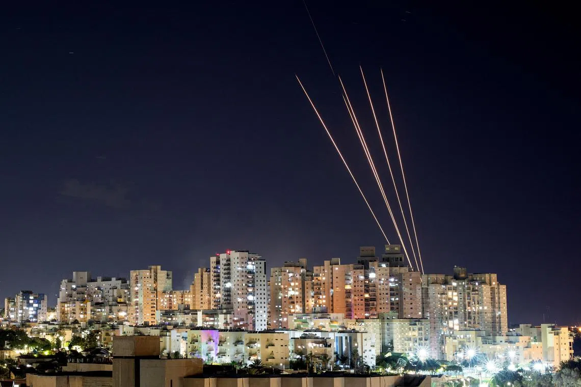 Rockets are launched by militants in the Gaza Strip towards central Israel.