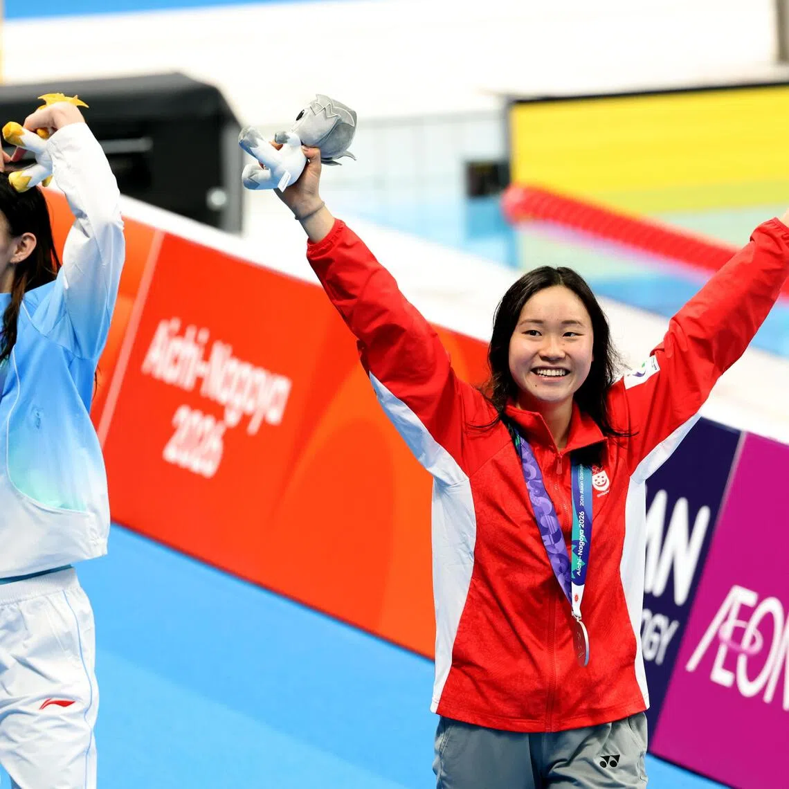 Singapore’s Gan Ching Hwee celebrates an unexpected Asian Games women’s 400m freestyle silver and national record.