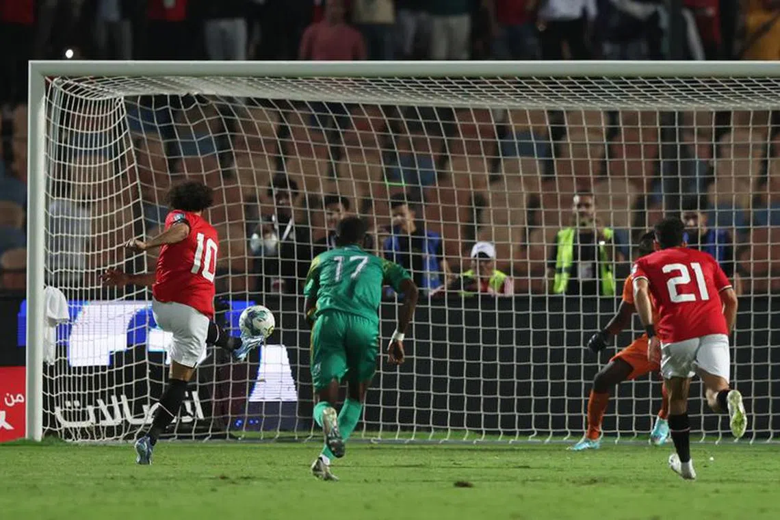Soccer Football - World Cup - CAF Qualifiers - Group A - Egypt v Djibouti - Cairo International Stadium, Cairo, Egypt - November 16, 2023  Egypt's Mohamed Salah scores their second goal from the penalty spot REUTERS/Amr Abdallah Dalsh
