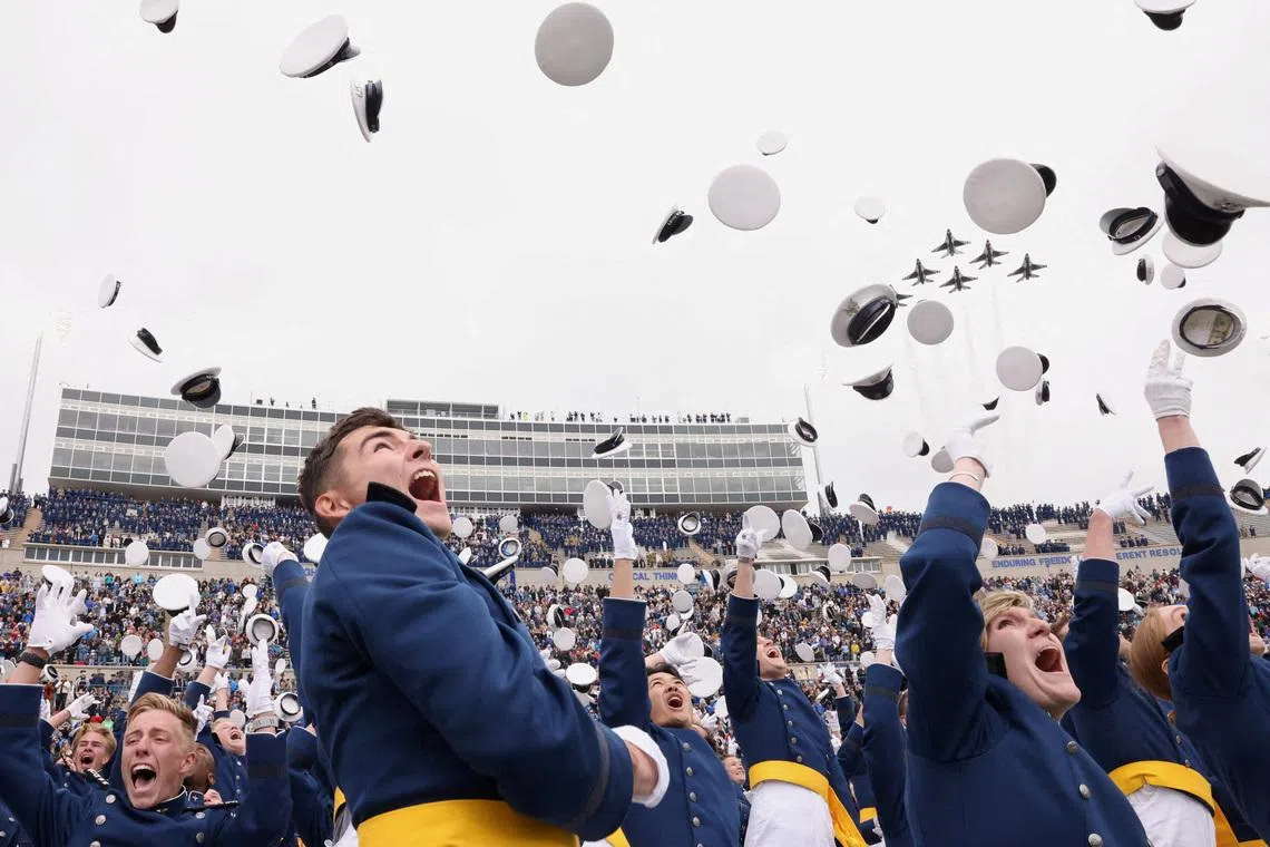Cadets of the graduating class of the United States Air Force Academy tossing their caps in the air on the day of US Vice President JD Vance's commencement address, in Colorado Springs, Colorado, US, on May 28, 2026. 