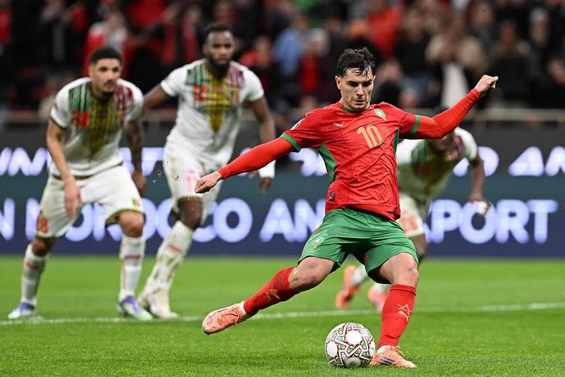Morocco's Brahim Diaz shoots from the penalty spot to score against Mali in the Africa Cup of Nations.