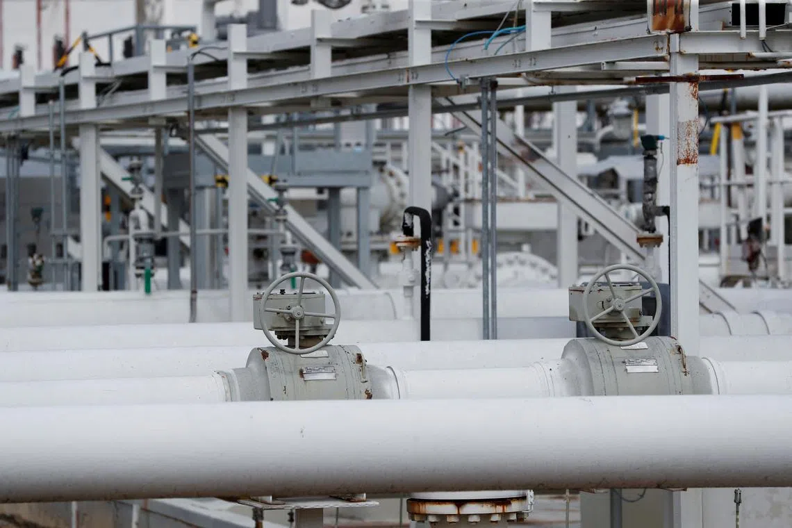 FILE PHOTO: A view of pipelines at Mero central oil tank farm, which moves crude through the Druzhba oil pipeline, near Nelahozeves, Czech Republic, August 10, 2022. REUTERS/David W Cerny/File Photo
