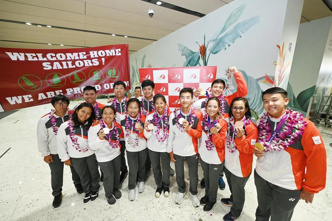 Singapore Sailors returning home to a "hero's welcome" after their Asian Games outing in China.