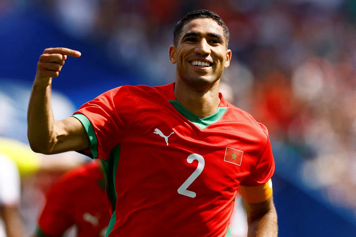 FILE PHOTO: Paris 2024 Olympics - Football - Men's Quarter-final - Morocco vs United States - Parc des Princes, Paris, France - August 02, 2024. Achraf Hakimi of Morocco celebrates scoring their third goal. REUTERS/Piroschka Van De Wouw/File Photo