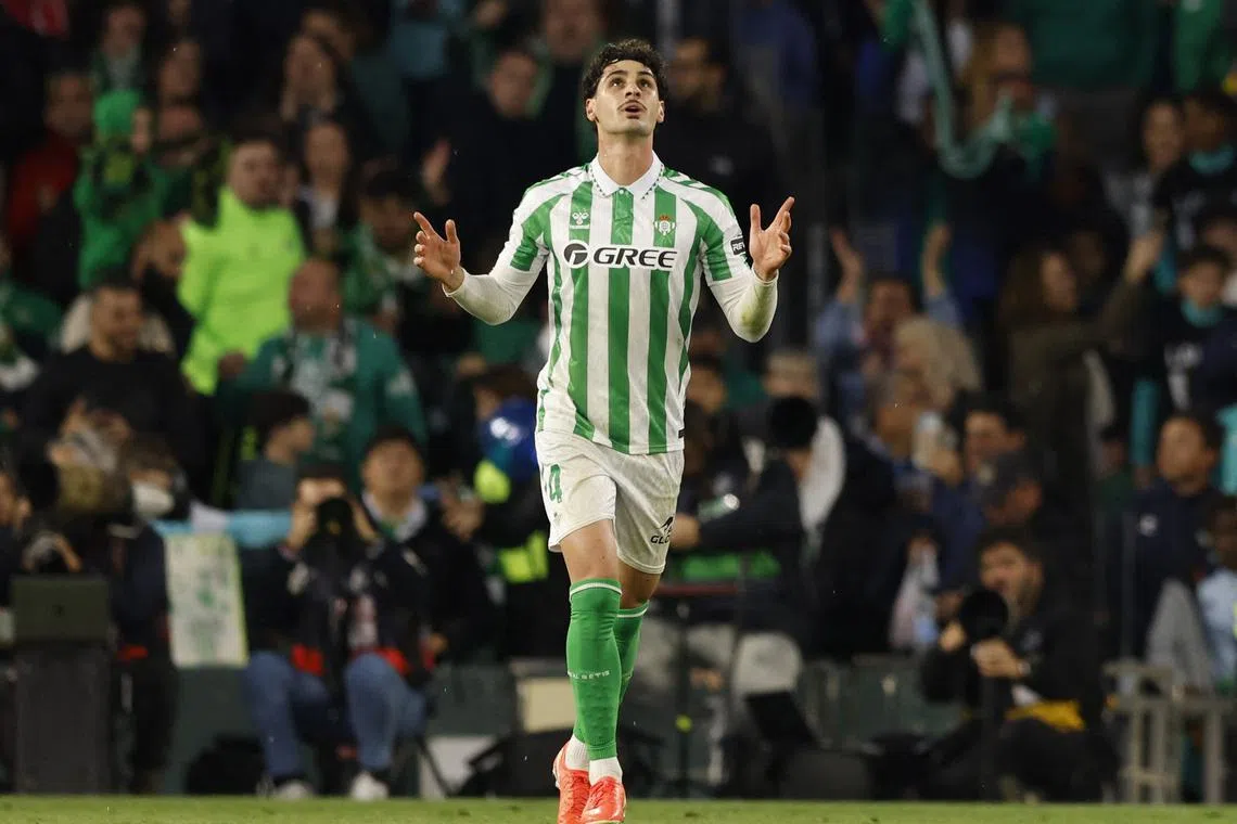 FILE PHOTO: Soccer Football - LaLiga - Real Betis v Real Madrid - Estadio Benito Villamarin, Seville, Spain - March 1, 2025 Real Betis' Johnny Cardoso celebrates scoring their first goal REUTERS/Marcelo Del Pozo/File photo