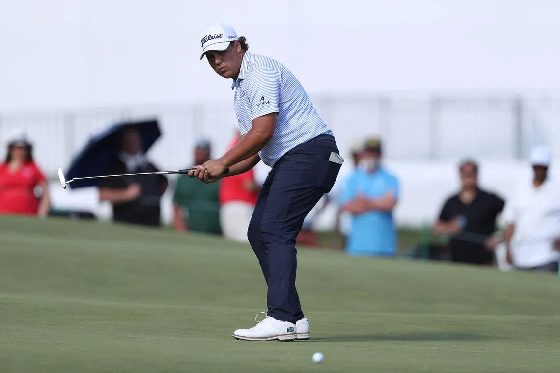Leader Aldrich Potgieter of South Africa reacting after a putt on the 18th green during the third round of the Rocket Classic 2025 at Detroit Golf Club on June 28, 2025 in Detroit, Michigan. He posted a seven-under 65, tied for the best round of the day, to get to 19-under 197.  