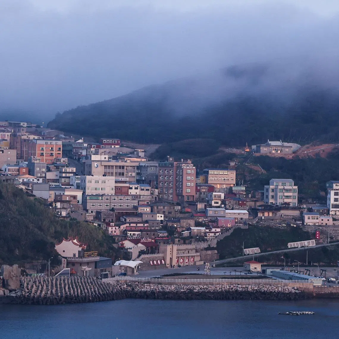 FILE PHOTO: A general view of the main residential and commercial area in Dongyin, Taiwan, March 15, 2022. Picture taken March 15, 2022. REUTERS/Ann Wang/File Photo