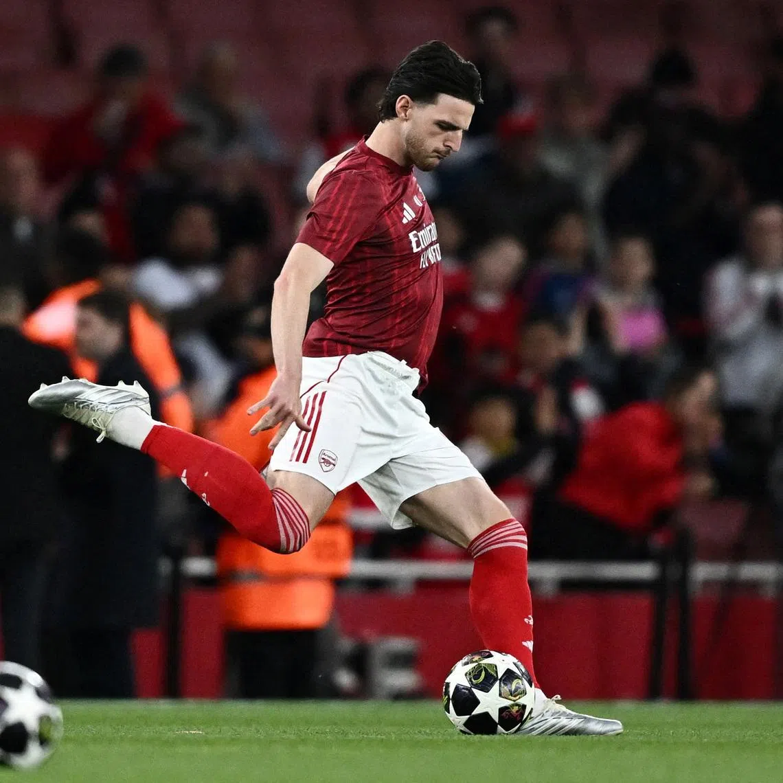 FILE PHOTO: Soccer Football - UEFA Champions League - Semi Final - Second Leg - Arsenal v Atletico Madrid - Emirates Stadium, London, Britain - May 5, 2026 Arsenal's Declan Rice during the warm up before the match REUTERS/Dylan Martinez/File Photo