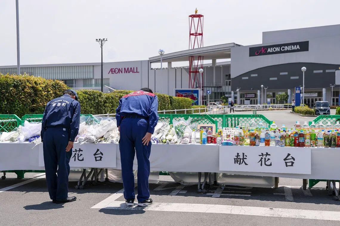 Japanese retailer Aeon says staff allowed to re-enter quake-hit mall before blast despite ban