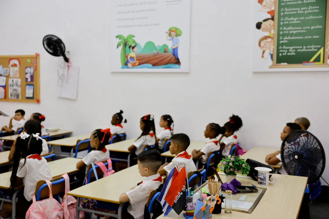 FILE PHOTO: Students attend class during the first day of the 2026-2027 school year amid a severe economic crisis that has prompted authorities to allow flexibility in schedules, attendance and school uniform requirements, in Havana, Cuba, September 1, 2026 REUTERS/Norlys Perez/File Photo