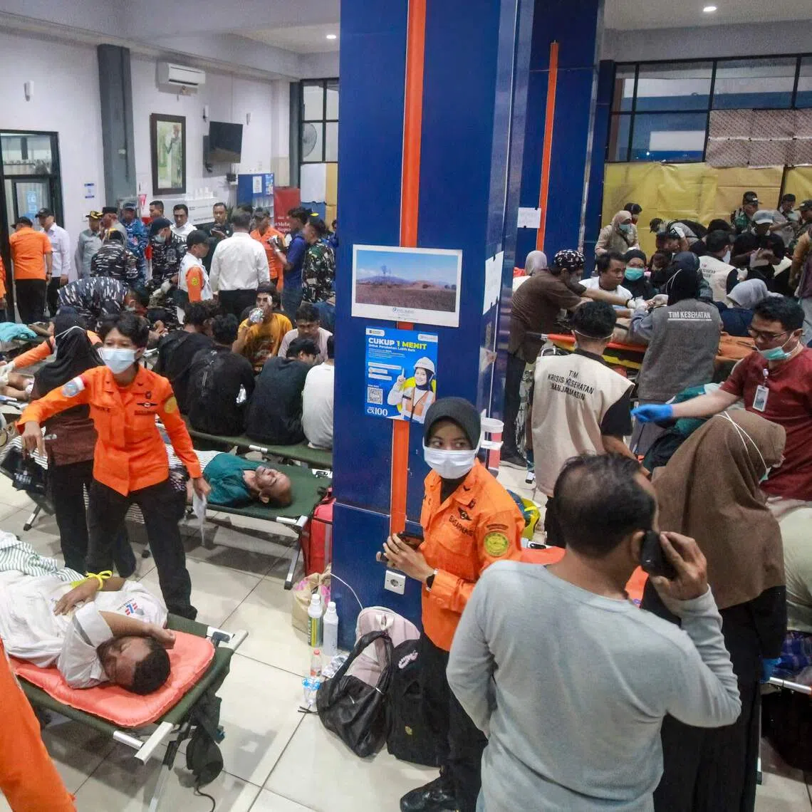 Rescue teams prepare to evacuate victims of the Virgo Transport 8 passenger ferry.