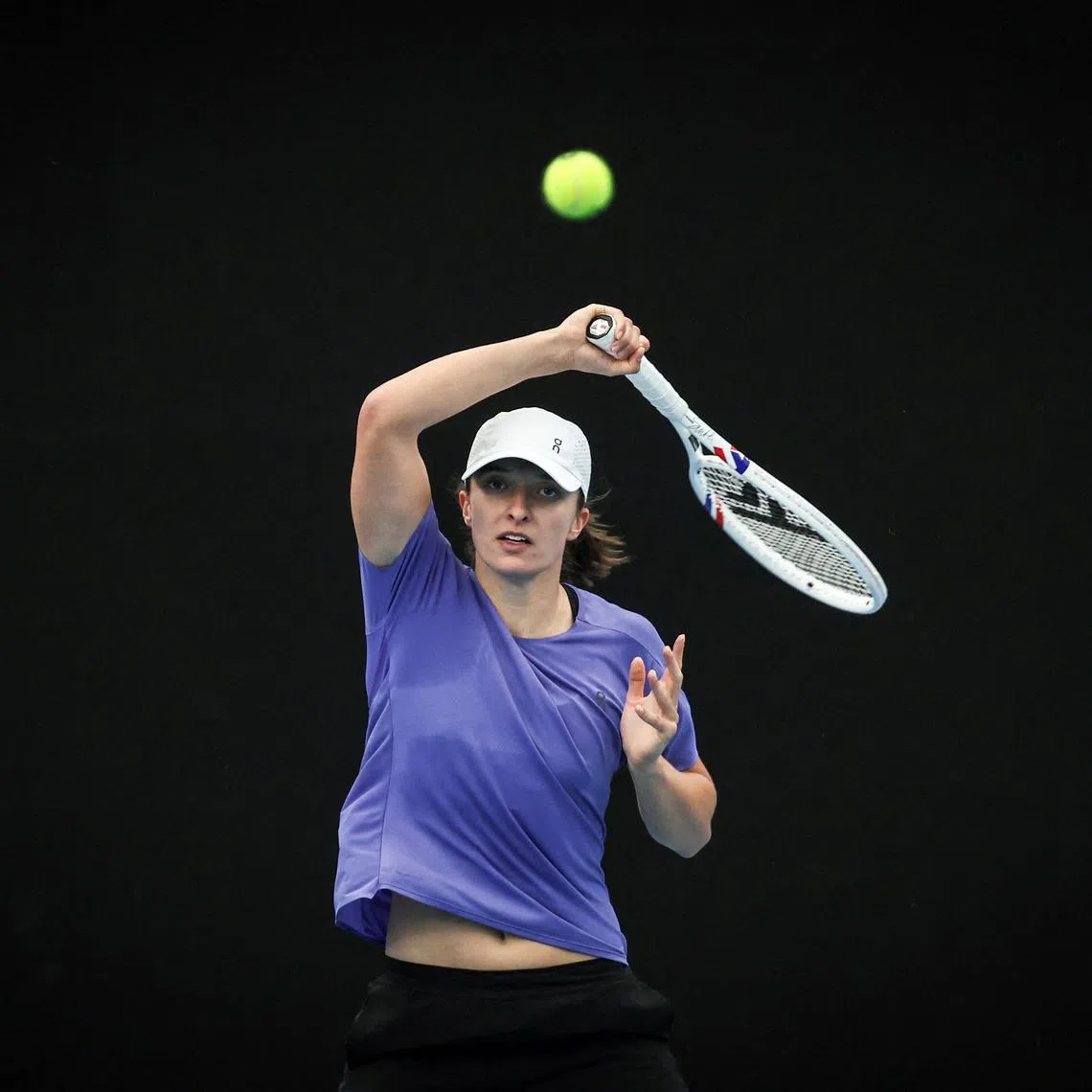 Poland's Iga Swiatek hits a shot during a practice session on Ken Rosewall Arena in Sydney.