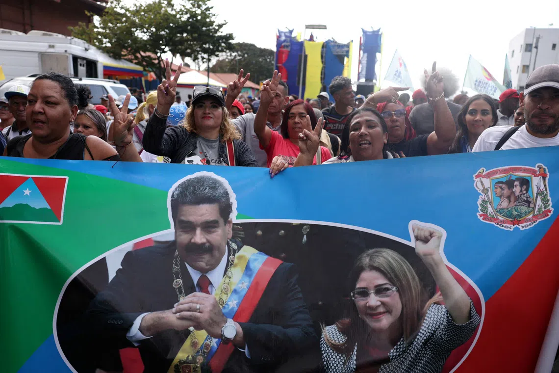FILE PHOTO: Supporters of Venezuela's government rally to demand the release of ousted President Nicolas Maduro and his wife, Cilia Flores, two months after their capture by the U.S., in Caracas, Venezuela March 3, 2026. REUTERS/Leonardo Fernandez Viloria/File Photo