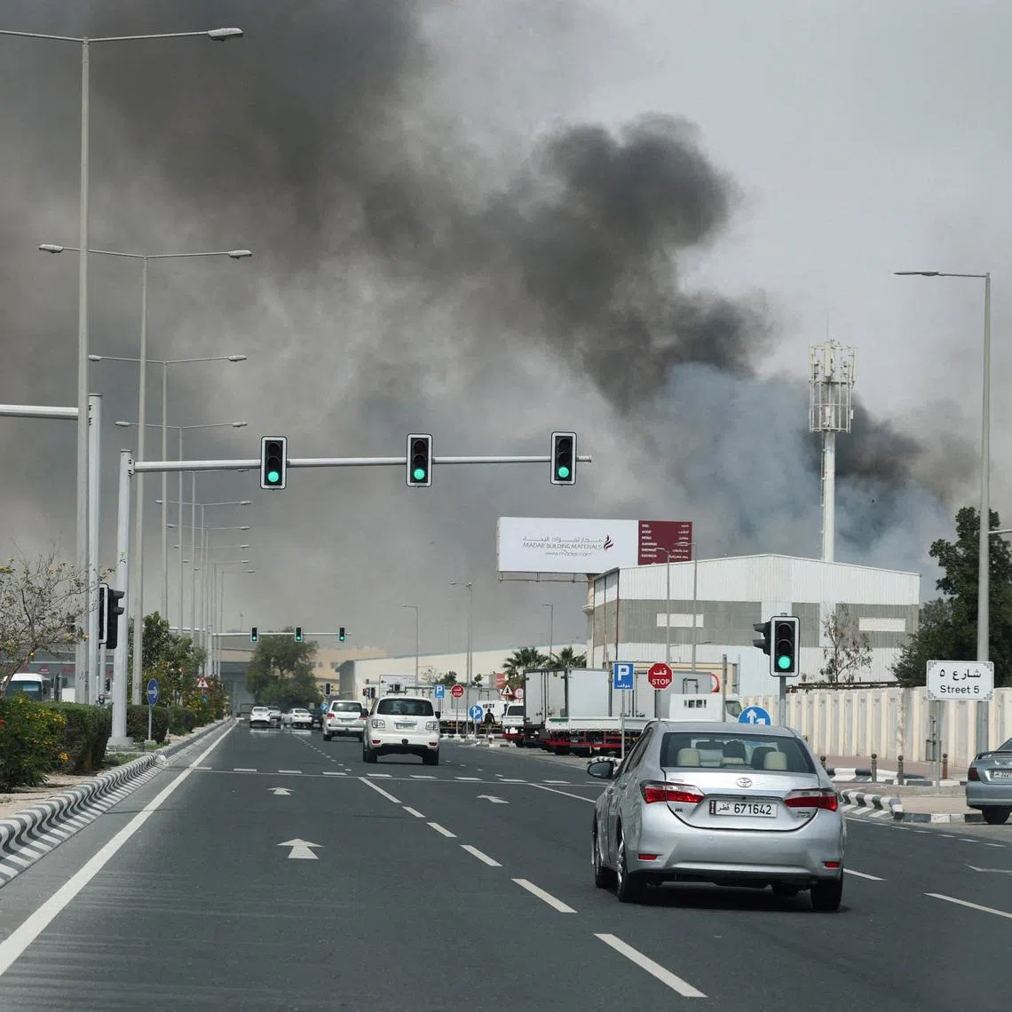 FILE PHOTO: Smoke rises after reported Iranian missile attacks, following United States and Israel strikes on Iran, as seen from Doha, Qatar, March 1, 2026. REUTERS/Mohammed Salem/File Photo