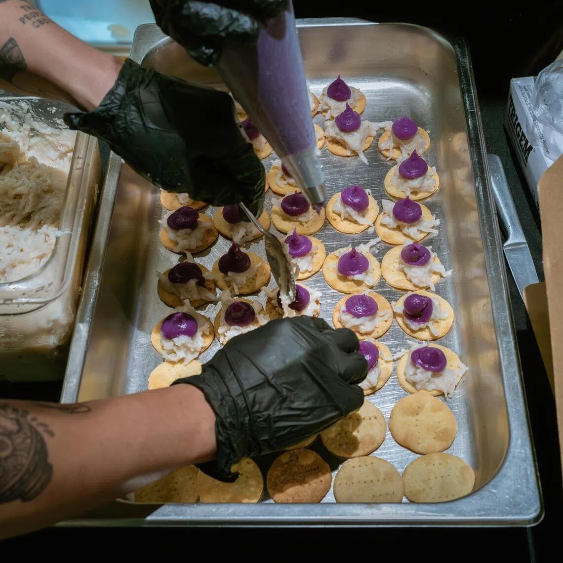 Ube pastries being served to guests in a Purple Yam store in Manila, Philippines in December 2025.