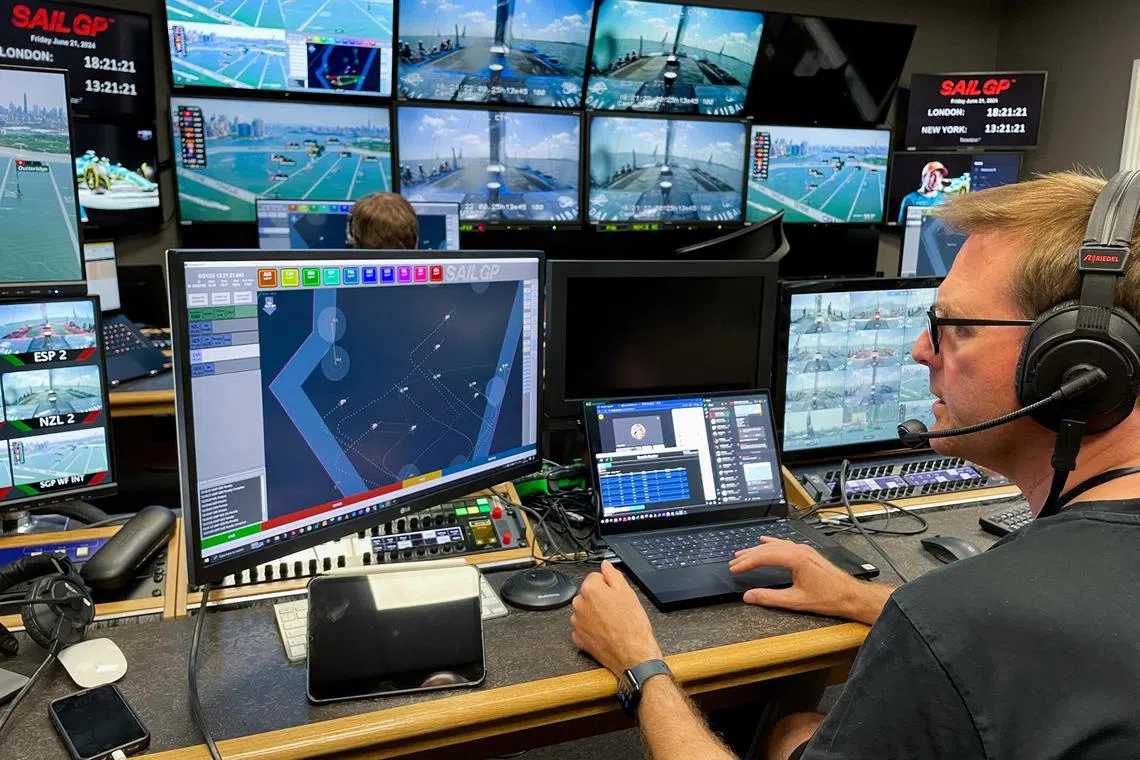 Craig Mitchell leads a team of SailGP umpires remotely overseeing New York Sail Grand Prix practice races from London, Britain on June 21, 2024. REUTERS/Alexander Smith