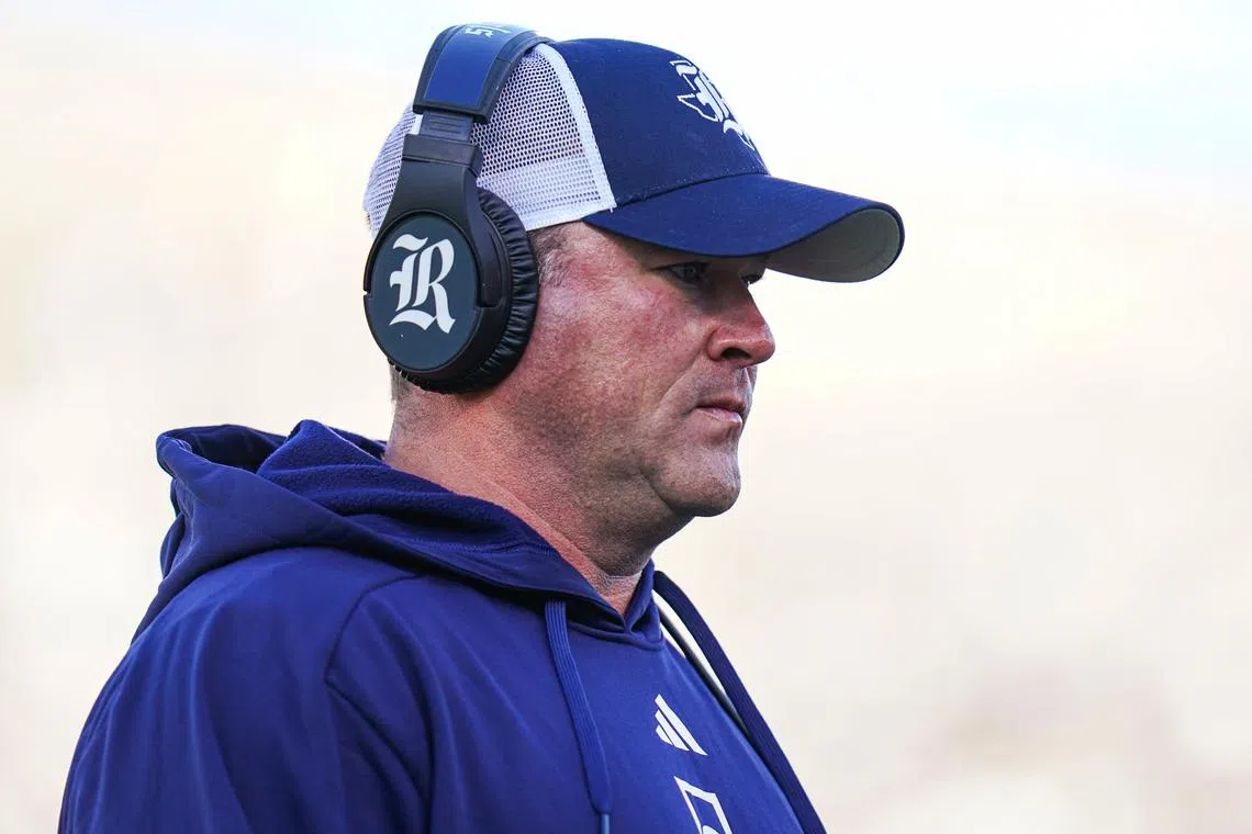FILE PHOTO: Oct 26, 2024; East Hartford, Connecticut, USA;  Rice Owls head coach Mike Bloomgren watches from the sideline as they take on the Connecticut Huskies at Rentschler Field at Pratt & Whitney Stadium. Mandatory Credit: David Butler II-Imagn Images/File Photo