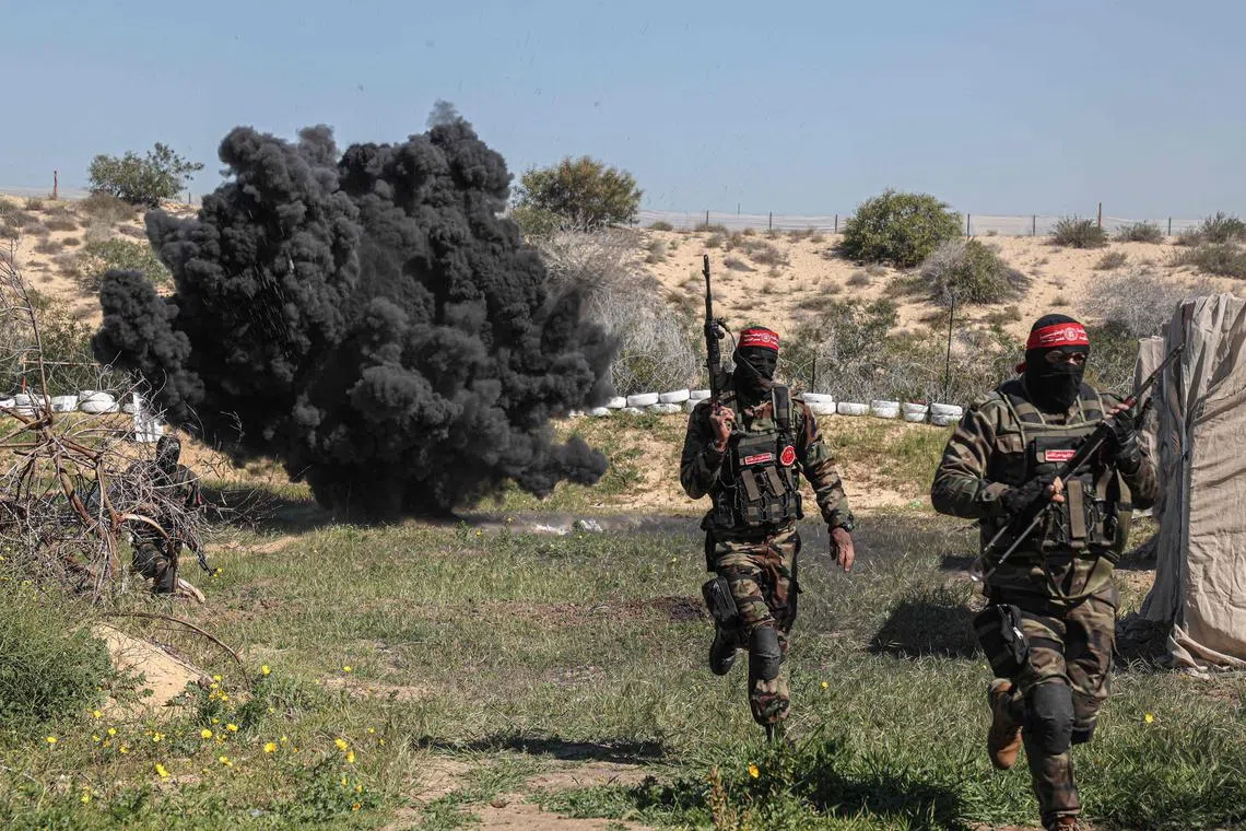 Fighters from the Democratic Front for the Liberation of Palestine take part in training drills in Rafah. 