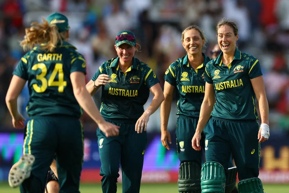 Cricket - ICC Women's T20 World Cup 2026 - Final - England v Australia - Lord's Cricket Ground, London, Britain - July 5, 2026 Australia's Ashleigh Gardner, Ellyse Perry, Beth Mooney and Kim Garth celebrate winning the ICC Women's T20 World Cup 2026 Action Images via Reuters/Peter Cziborra