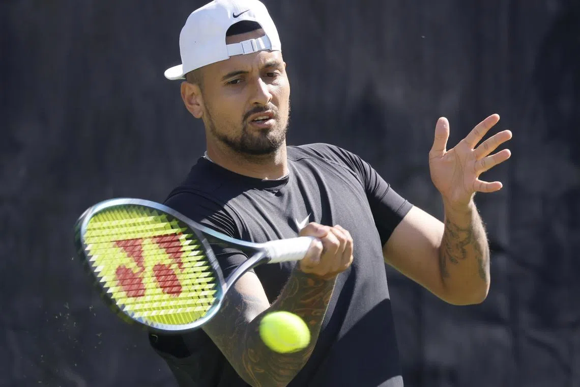 epa10688814 Nick Kyrgios of Australia in action during his first round match against Yibing Wu of China at the ATP Boss Open tennis tournament in Stuttgart, Germany, 13 June 2023.  EPA-EFE/RONALD WITTEK