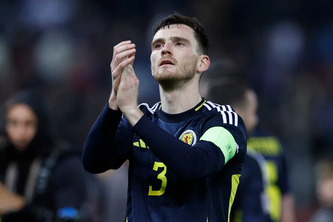 Soccer Football - Nations League - Play-offs - First Leg - Greece v Scotland - Karaiskakis Stadium, Piraeus, Greece - March 20, 2025 Scotland's Andy Robertson applauds fans after the match REUTERS/Louiza Vradi/ File Photo