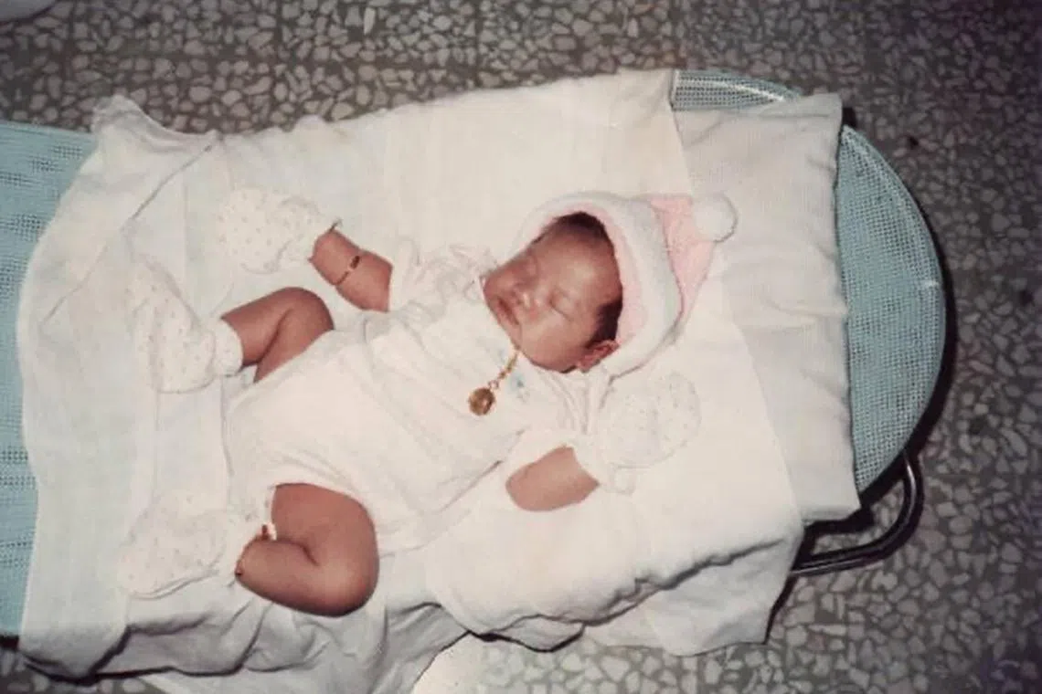 sfsearch25 - Ms Victoria Ng soon after birth.  She was sold to her parents for RM8,000 in Selangor, Malaysia.

ST Newsdesk
Credit: Ms Victoria Ng