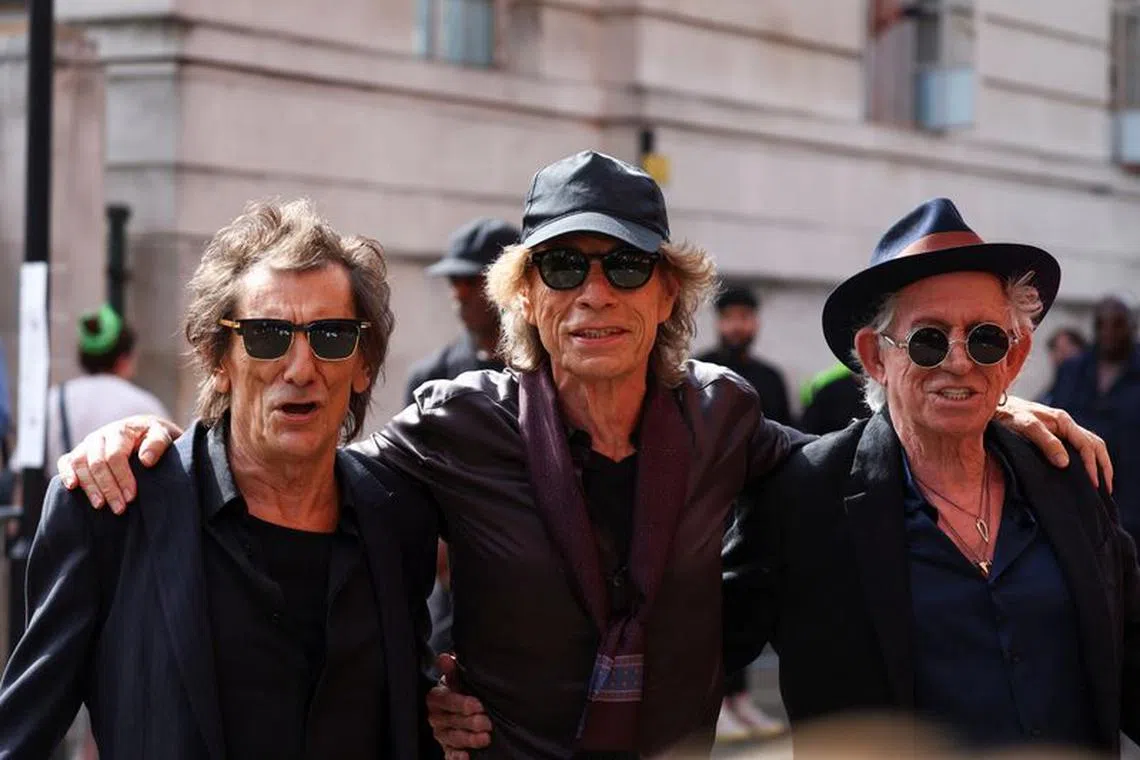 Rolling Stones band members Mick Jagger, Keith Richards and Ronnie Wood attend a launch event for their new album \"Hackney Diamonds\", at Hackney Empire in London, Britain, September 6, 2023. REUTERS/Toby Melville