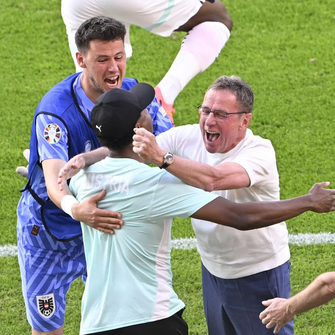Soccer Football - Euro 2024 - Group D - Netherlands v Austria - Berlin Olympiastadion, Berlin, Germany - June 25, 2024 Austria coach Ralf Rangnick and David Alaba celebrate after the match REUTERS/Fabian Bimmer