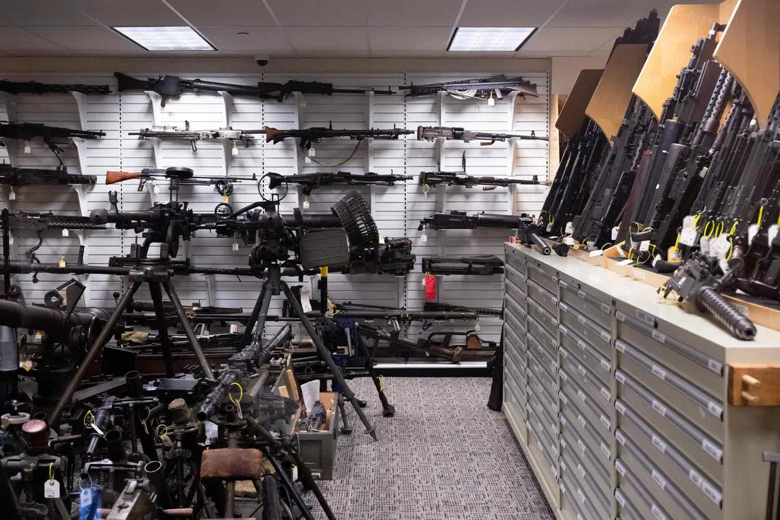 Handguns, semi-automatic and fully automatic firearms are seen in the National Firearm Reference Vault, which holds thousands of guns, at the Bureau of Alcohol, Tobacco, Firearms and Explosives (ATF) National Services Center in Martinsburg, West Virginia, September 4, 2024. (Photo by SAUL LOEB / AFP)
