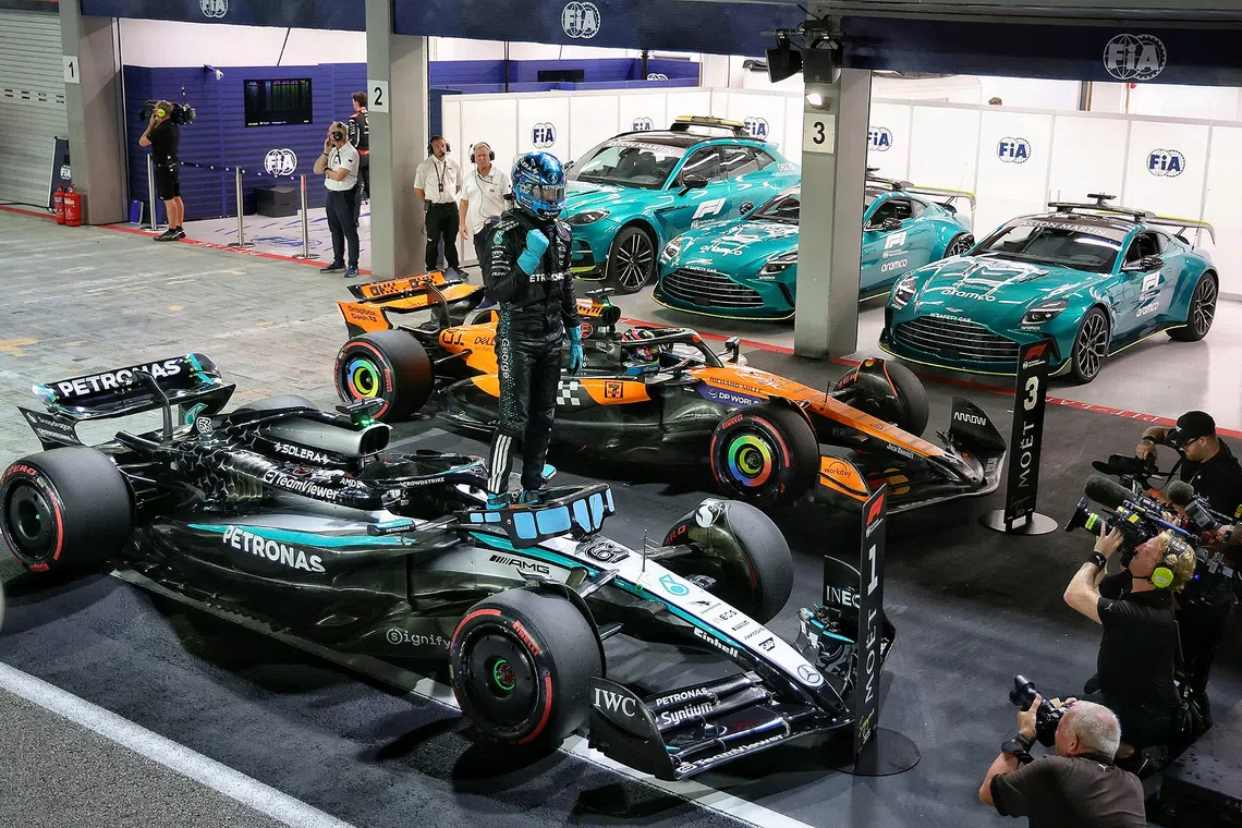 Mercedes’ George Russell reacts after securing pole position during the qualifying session of the 2025 Formula One Singapore Airlines Singapore Grand Prix at the Marina Bay Street Circuit on Oct 4, 2025. 
