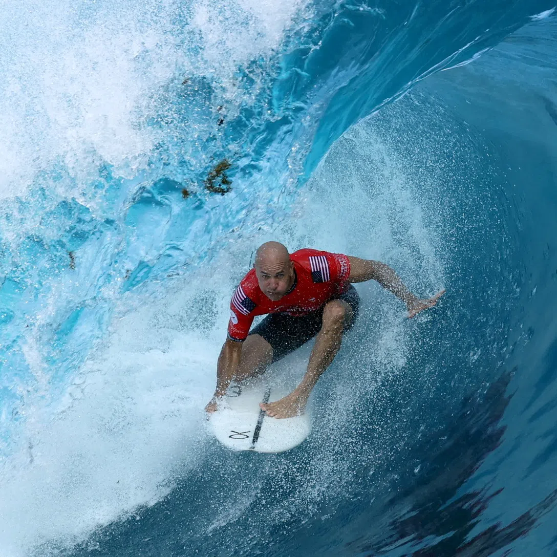 FILE PHOTO: Surfing - World Surf League - Tahiti Pro - Teahupo'o, Tahiti, French Polynesia - May 30, 2024  Kelly Slater of the U.S. in action during the quarterfinals heat 1 REUTERS/Thomas Bevilacqua/File Photo