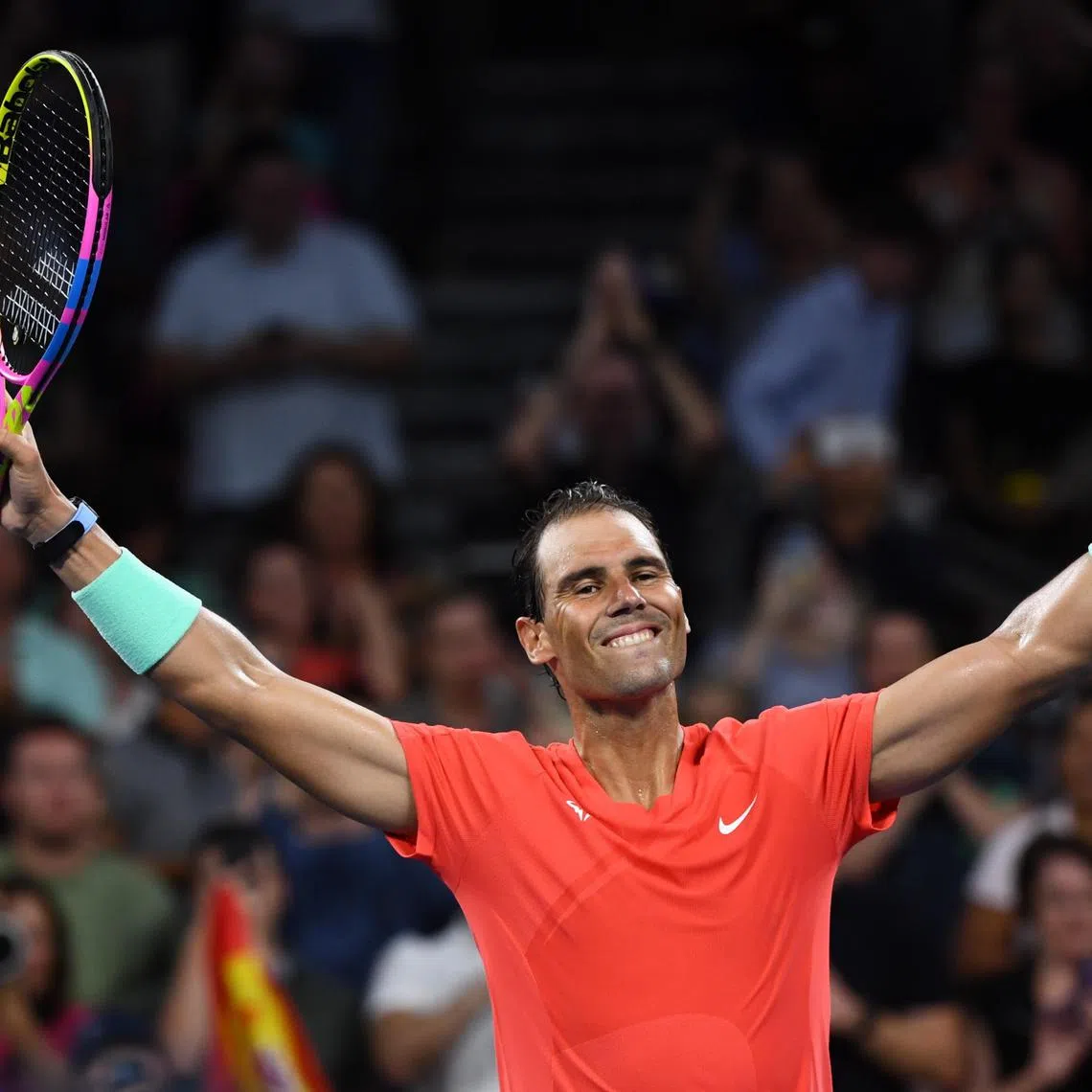 Rafael Nadal celebrates after beating Dominic Thiem in the first round of the Brisbane International.