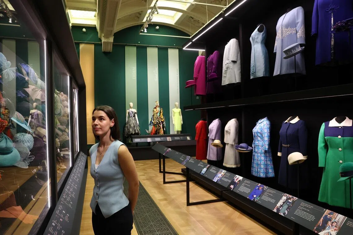 ‘Sartorial diplomacy’ on show in expo of late UK queen’s fashion