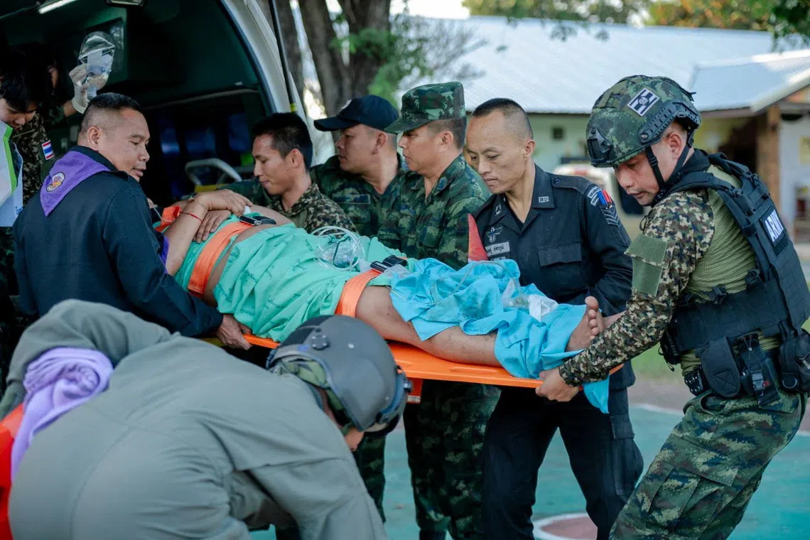 An injured soldier is transferred to a hospital following a clash between Thai and Cambodian troops over a disputed border area in Sisaket Province, Thailand, on Dec 7.