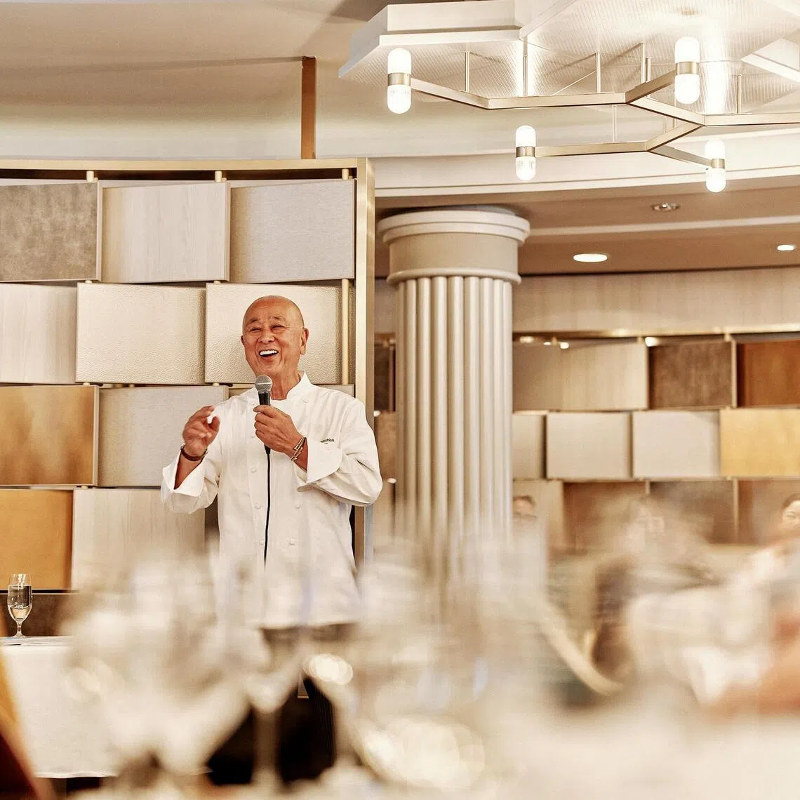Chef Nobu Matsuhisa at a sake tasting at his restaurant  Umi Uma aboard Crystal Cruises.