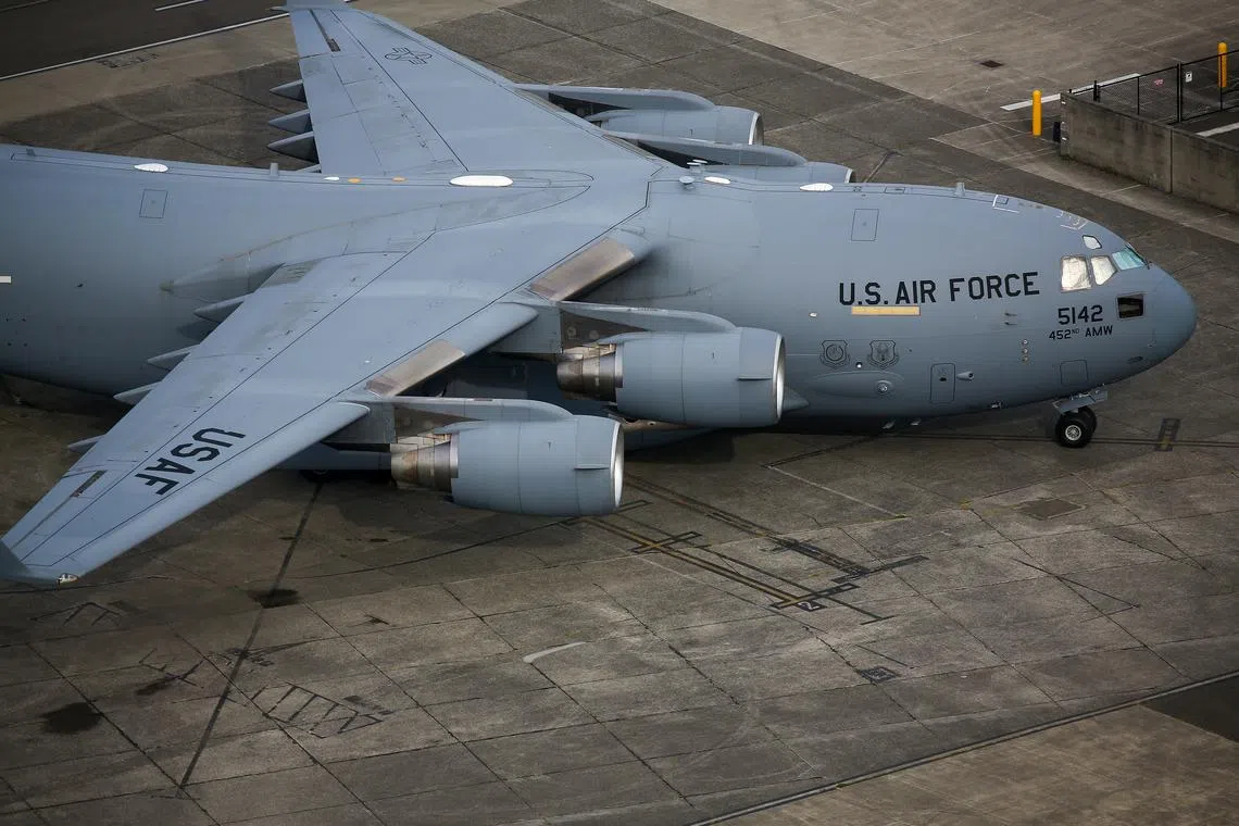 FILE PHOTO: An aerial view of a USAF Boeing C-17 Globemaster III aircraft parked at King County International Airport-Boeing Field in Seattle, Washington, U.S, June 1, 2022.  REUTERS/Lindsey Wasson/File Photo