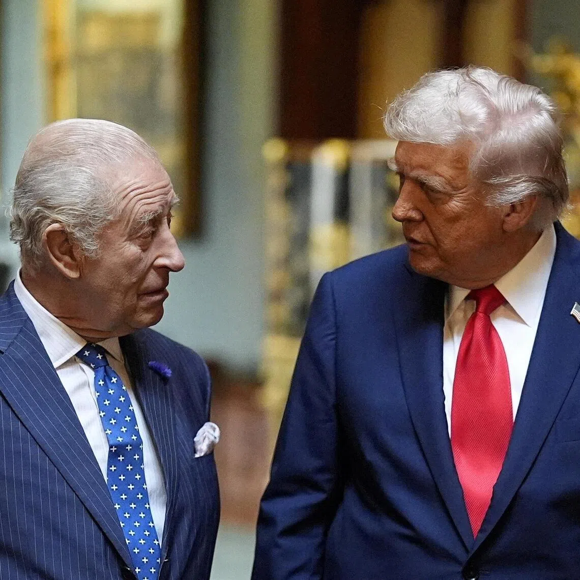 FILE PHOTO: King Charles III (left) with US President Donald Trump at Windsor Castle, Berkshire, before formally bidding farewell to the president on day two of their state visit to the UK, September 18, 2025.    Aaron Chown/Pool via REUTERS/File Photo