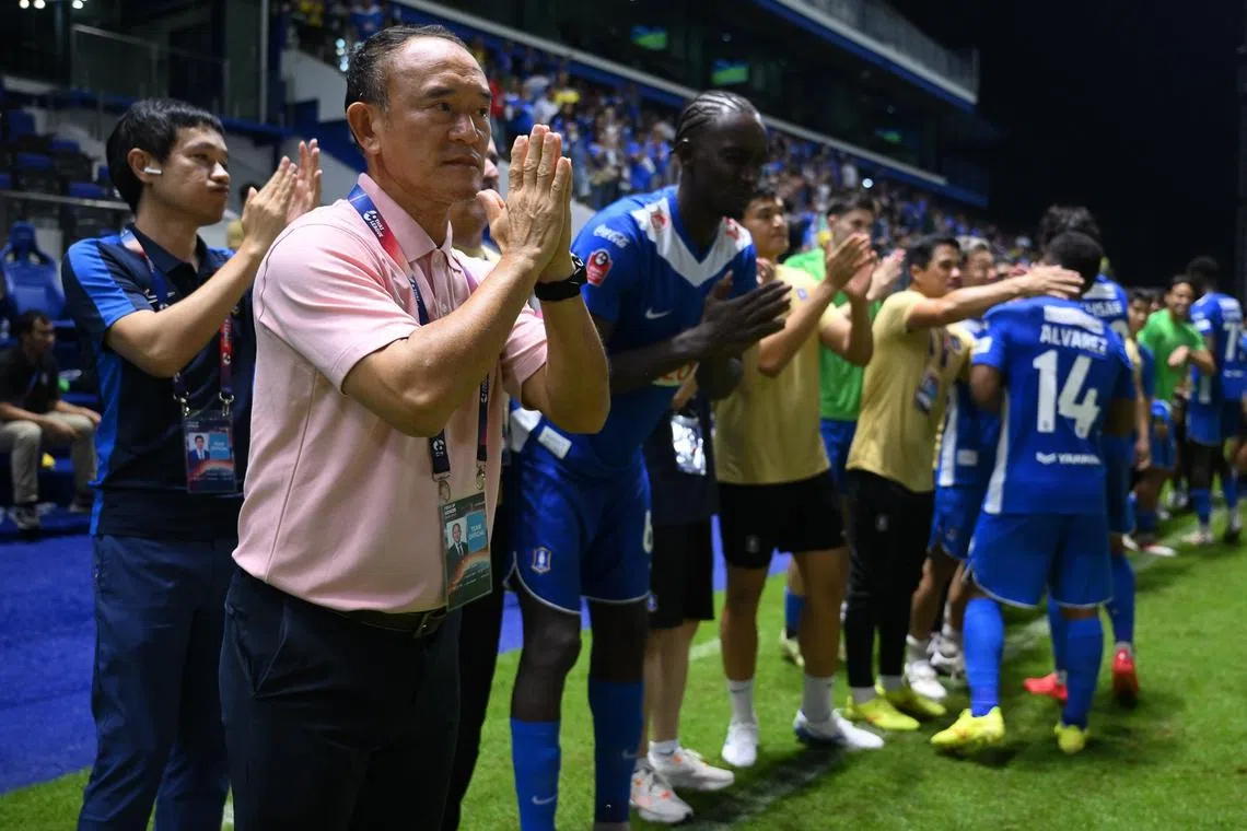 BG Pathum's director of football Surachai Jaturapattarapong (in pink) had played in Singapore for many years.