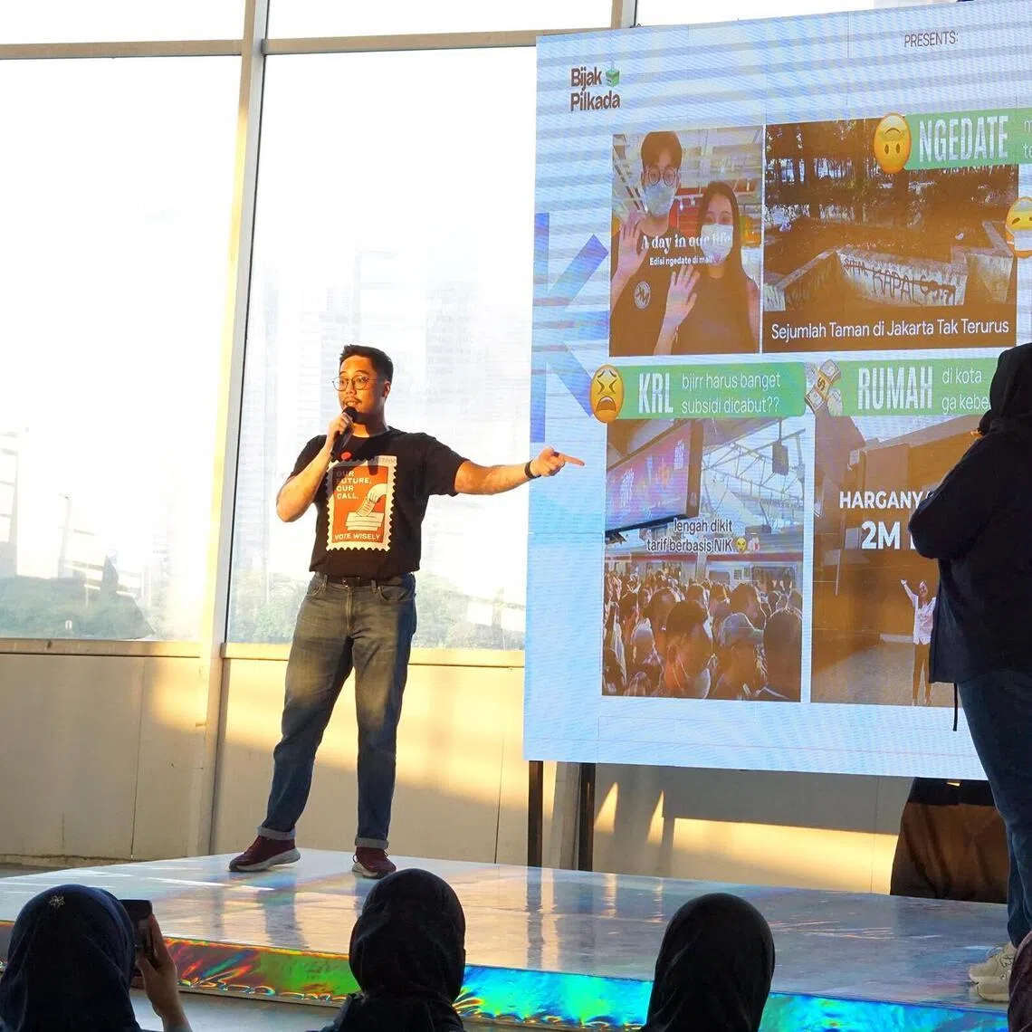 Mr Efraim Leonard speaking at a community gathering where participants discuss socio-political issues in August 2024.