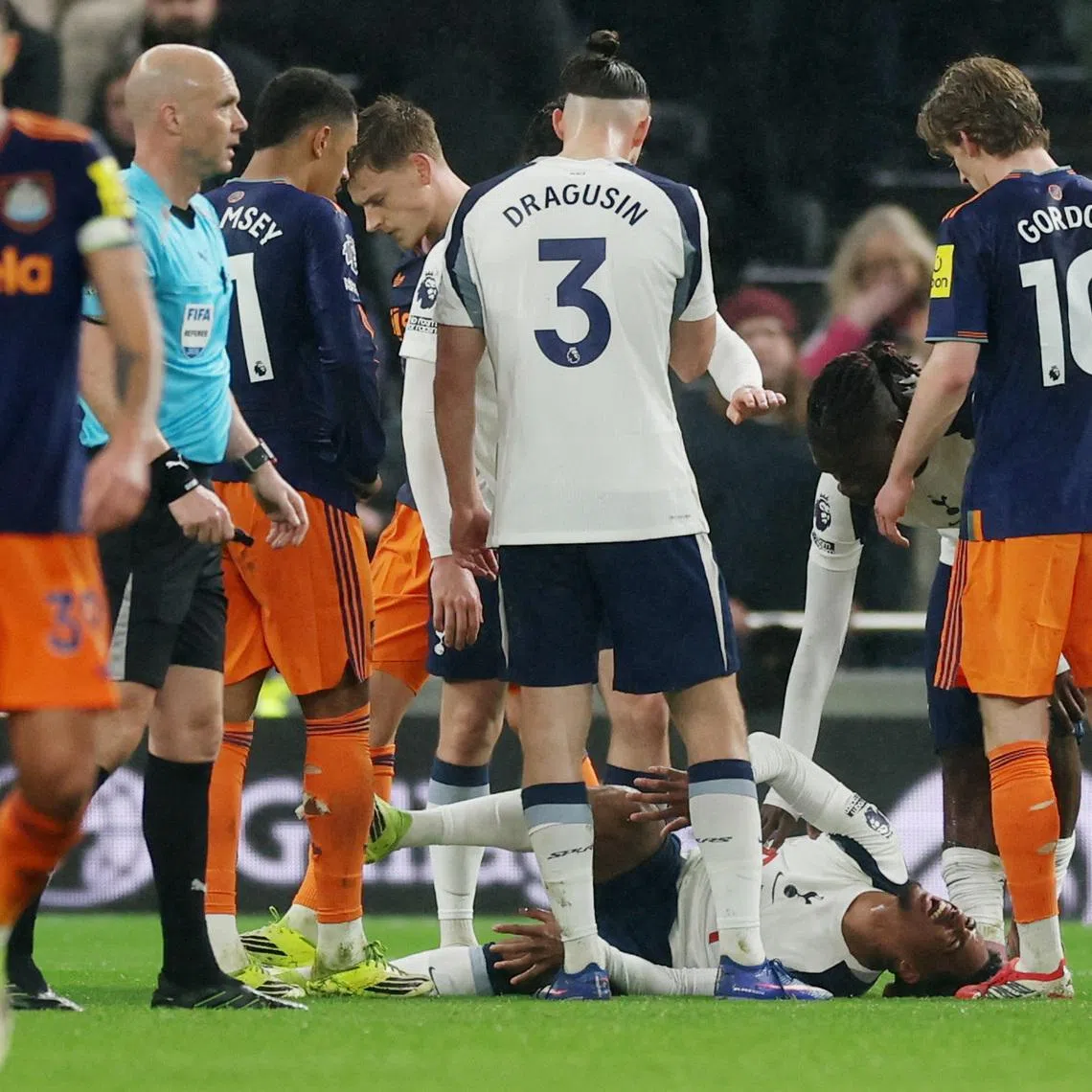 Soccer Football - Premier League - Tottenham Hotspur v Newcastle United - Tottenham Hotspur Stadium, London, Britain - February 10, 2026  Tottenham Hotspur's Wilson Odobert reacts after sustaining an injury Action Images via Reuters/Paul Childs