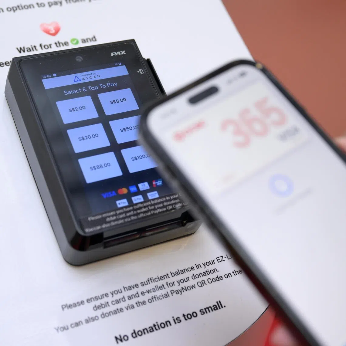 ntsmrt14/	ST20251114_202581100932/Ng Sor Luan/Senior Minister of State at the Ministry of Transport, Sun Xue Ling launching Tap for Hope, a fund-raising initiative by SMRT at Woodlands MRT Station on Nov 14, 2025.