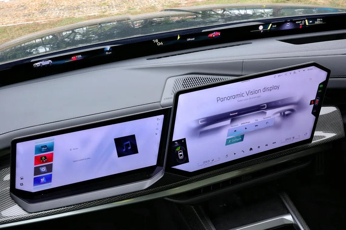 Passenger gets a dedicated screen while the driver has one and information projected onto a black band under the windscreen.