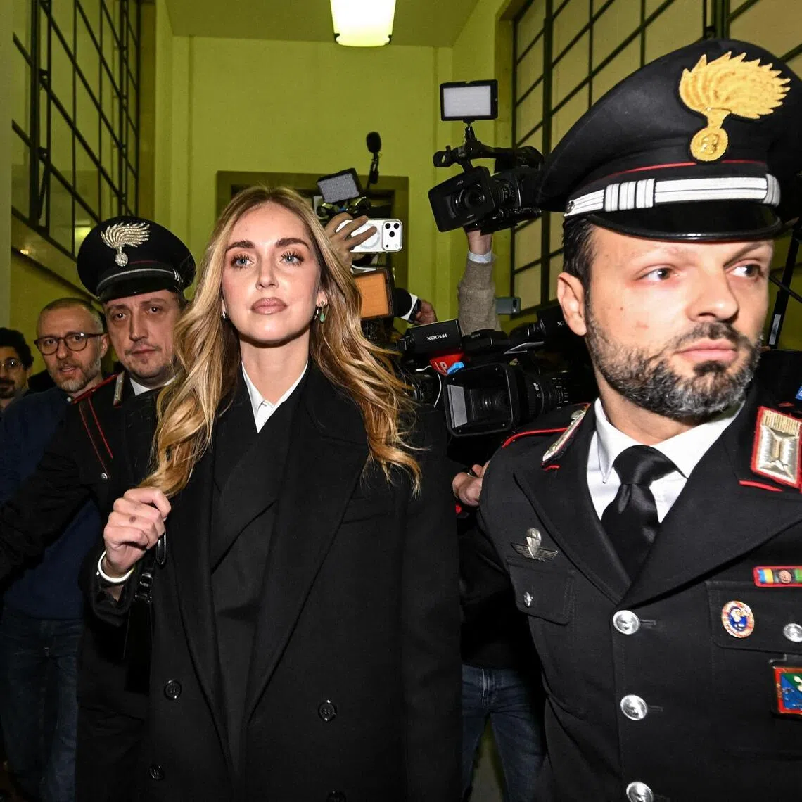 Italian influencer and businesswoman Chiara Ferragni leaving a court in Milan on Jan 14, after being acquitted of fraud.