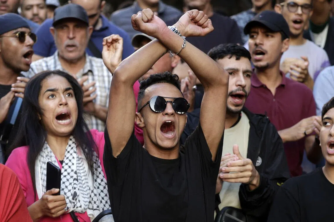 Moroccans from a collective calling itself GenZ 212 rallying in Rabat on Oct 3 to demand reforms to public healthcare and education.