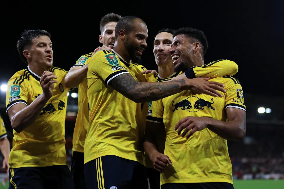 Leeds United’s James Justin celebrates their second goal with teammates in their 2-0 League Cup win over Nottingham Forest.