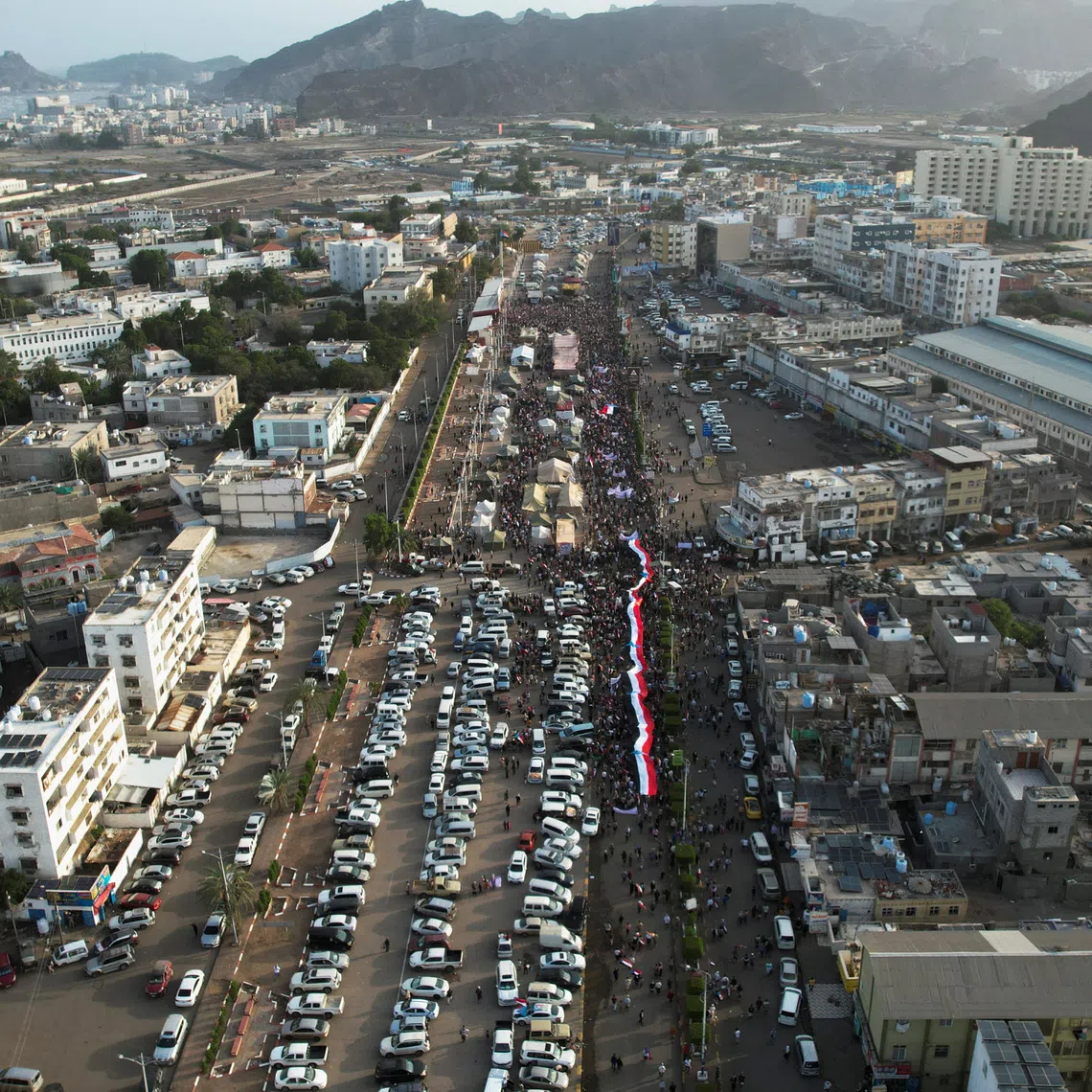 A drone view shows people attending a rally organised by Yemen's main separatist group, the Southern Transitional Council (STC), in Aden, Yemen December 21, 2025. REUTERS/Fawaz Salman