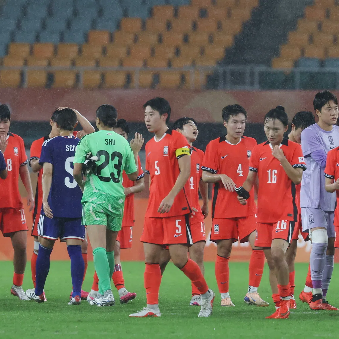 South Korean players react after losing to Japan in the women’s football semi-final match at the Aichi-Nagoya Asian Games on Sept 29.