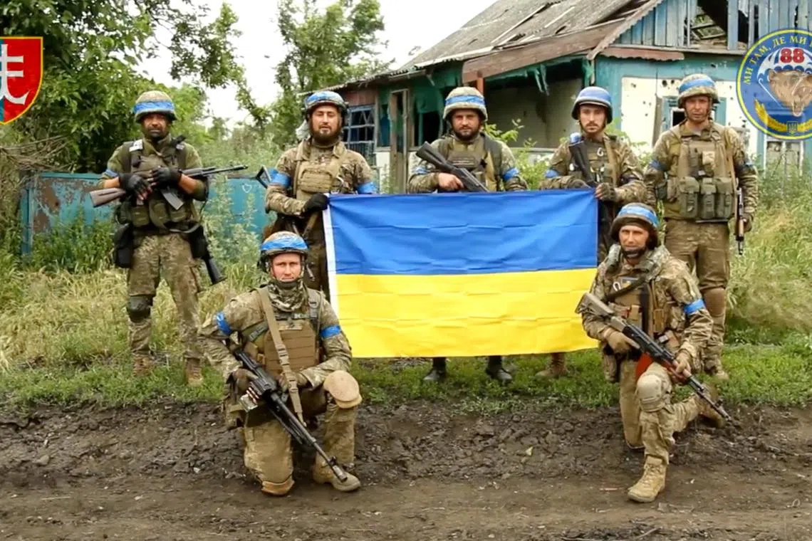 A screengrab from a video released on  June 12 shows Ukrainian servicemen in the liberated village of Storozheve in Dontesk region.