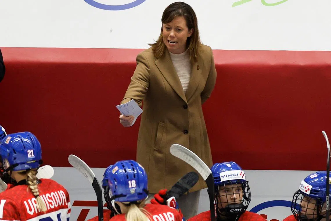 Ice Hockey - IIHF Women's World Championships - Bronze Medal Game - Finland v Czech Republic - Budvar Arena, Ceske Budejovice, Czech Republic - April 20, 2025 Czech Republic head coach Carla MacLeod speaks to players during the match REUTERS/David W Cerny